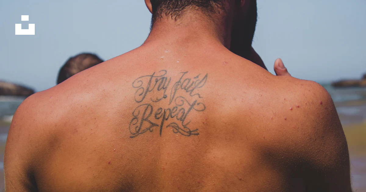 Try Fail Repeat Person with try fail repeat tattoo at back photo – Free Essaouira Image ...