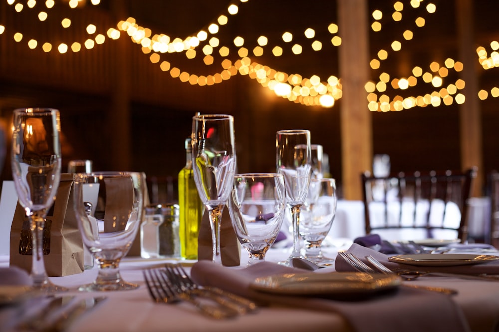 champagne glasses and plate on table