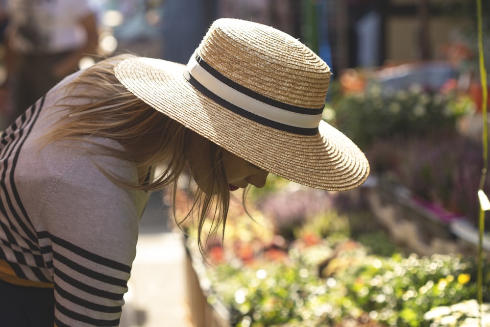 woman wearing brown sunhat