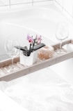 two wine glasses on tray
