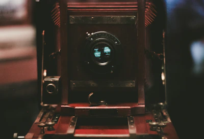 Close-up of a vintage lens with intricate details and reflections