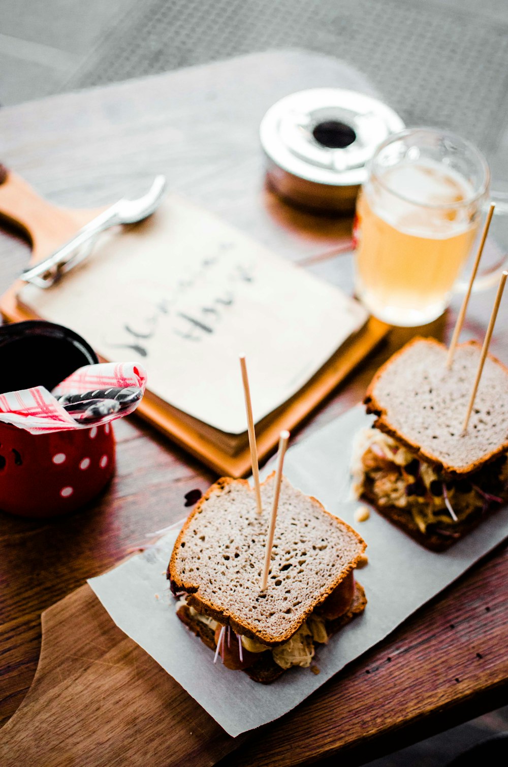 sandwich beside glass cup photo