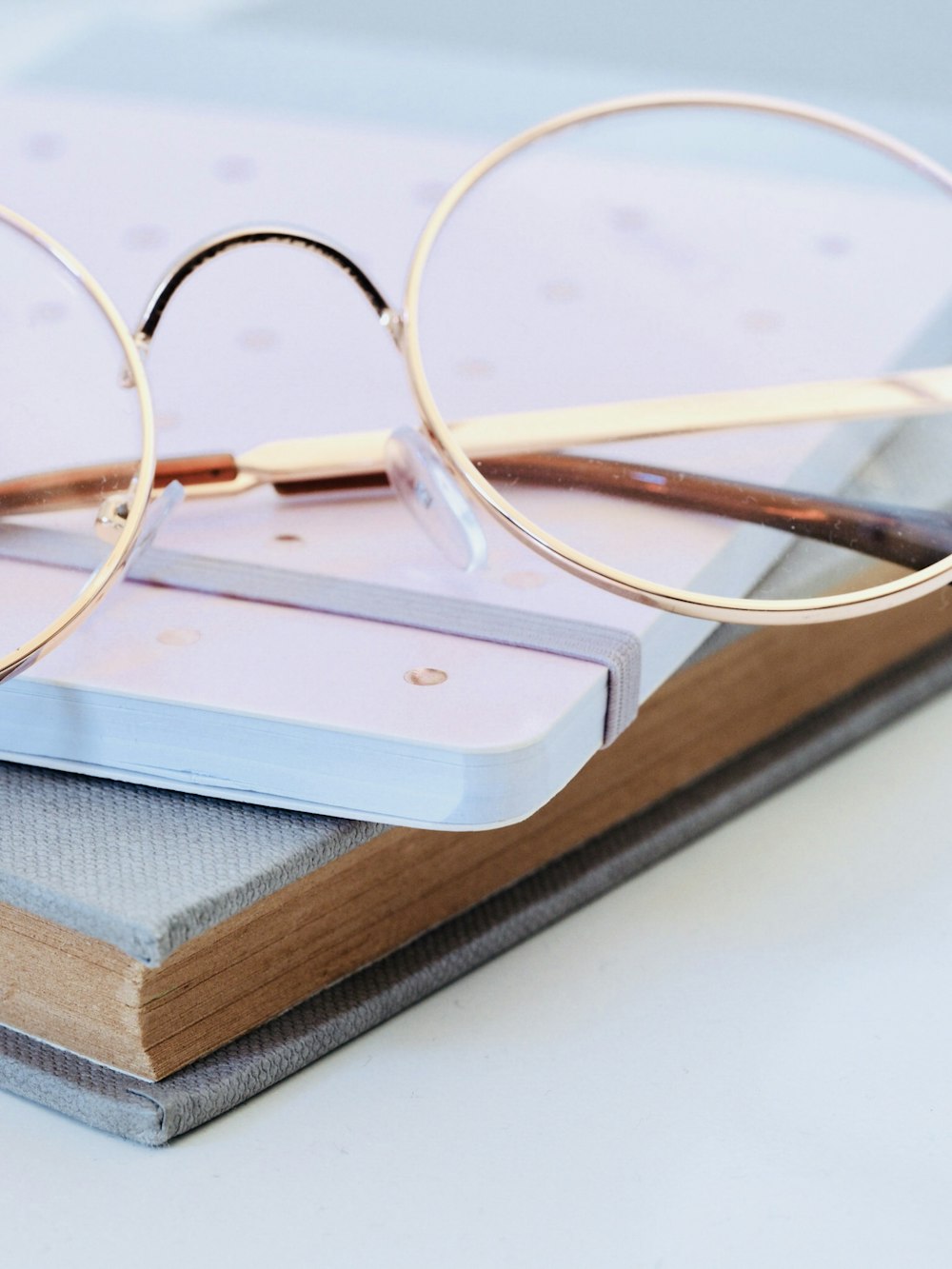 eyeglasses on book