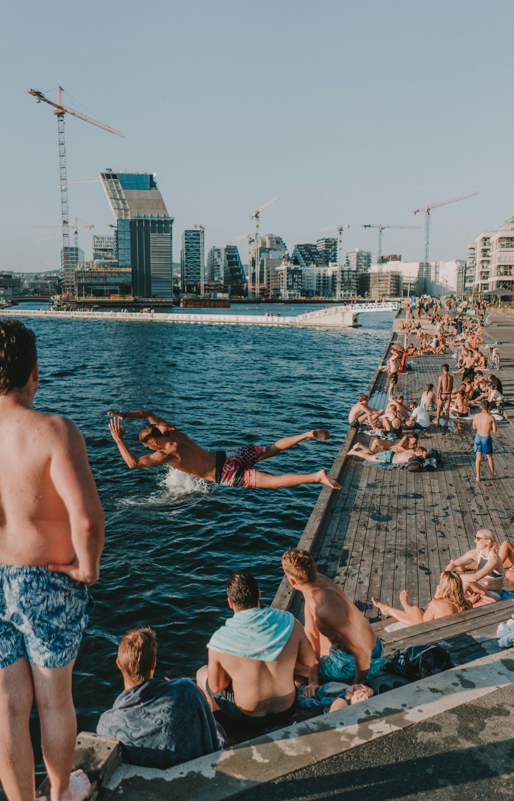 people near body of water