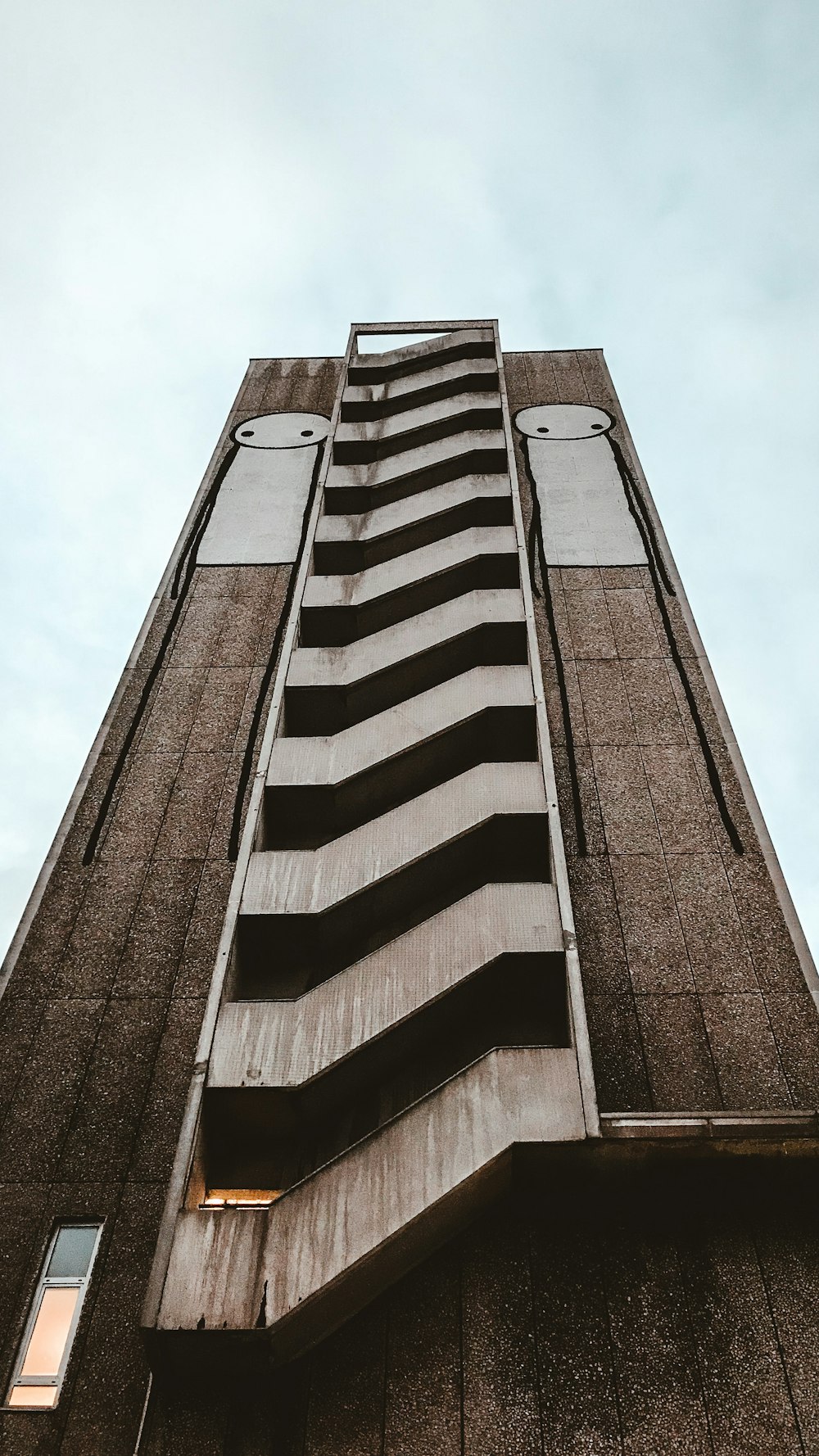 worms eye view of brown building