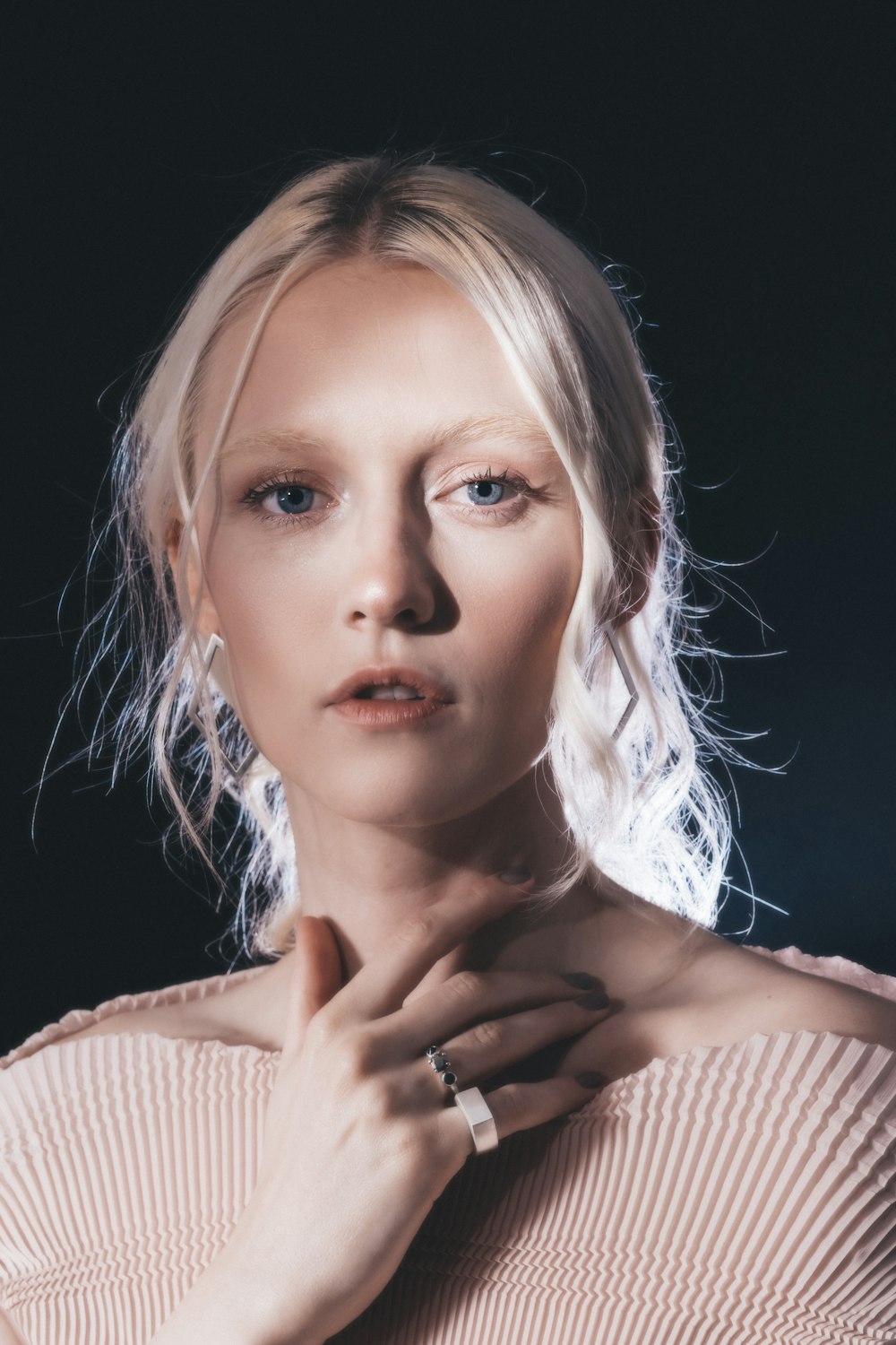 woman wearing beige tops