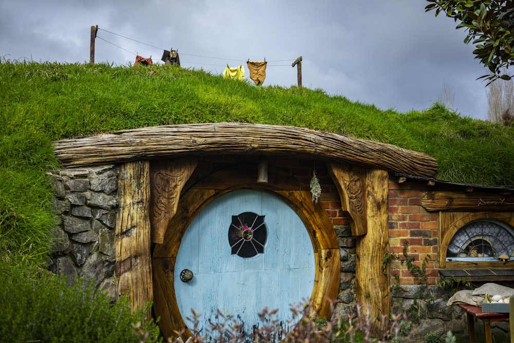 brown house under hill