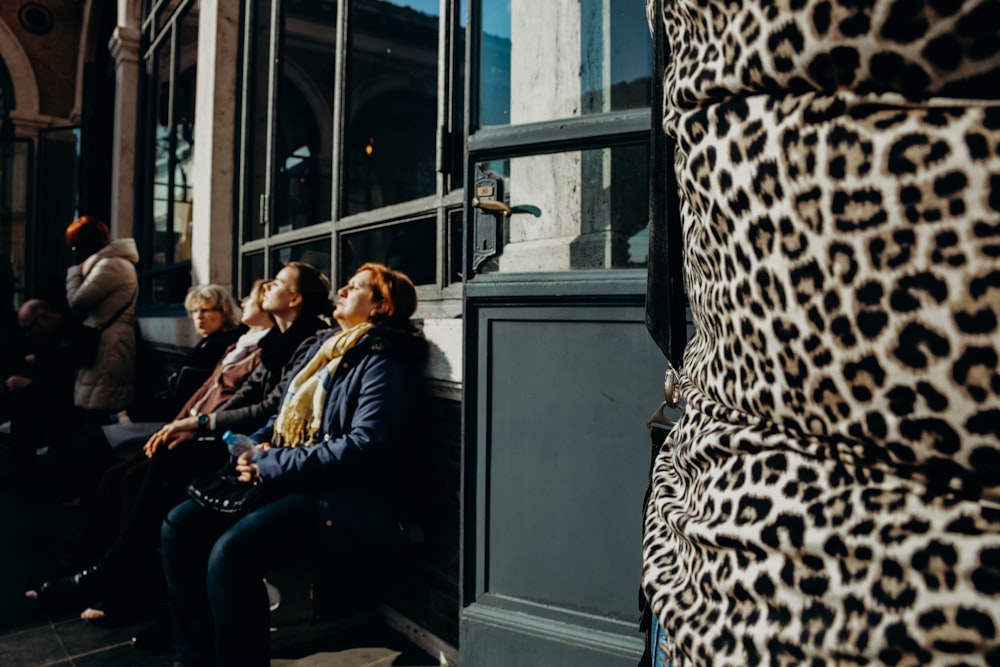 closeup photography of black and brown leopard print shirt