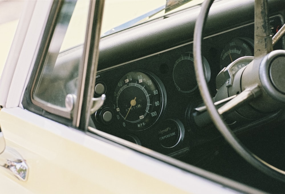 white car with black cluster gauge