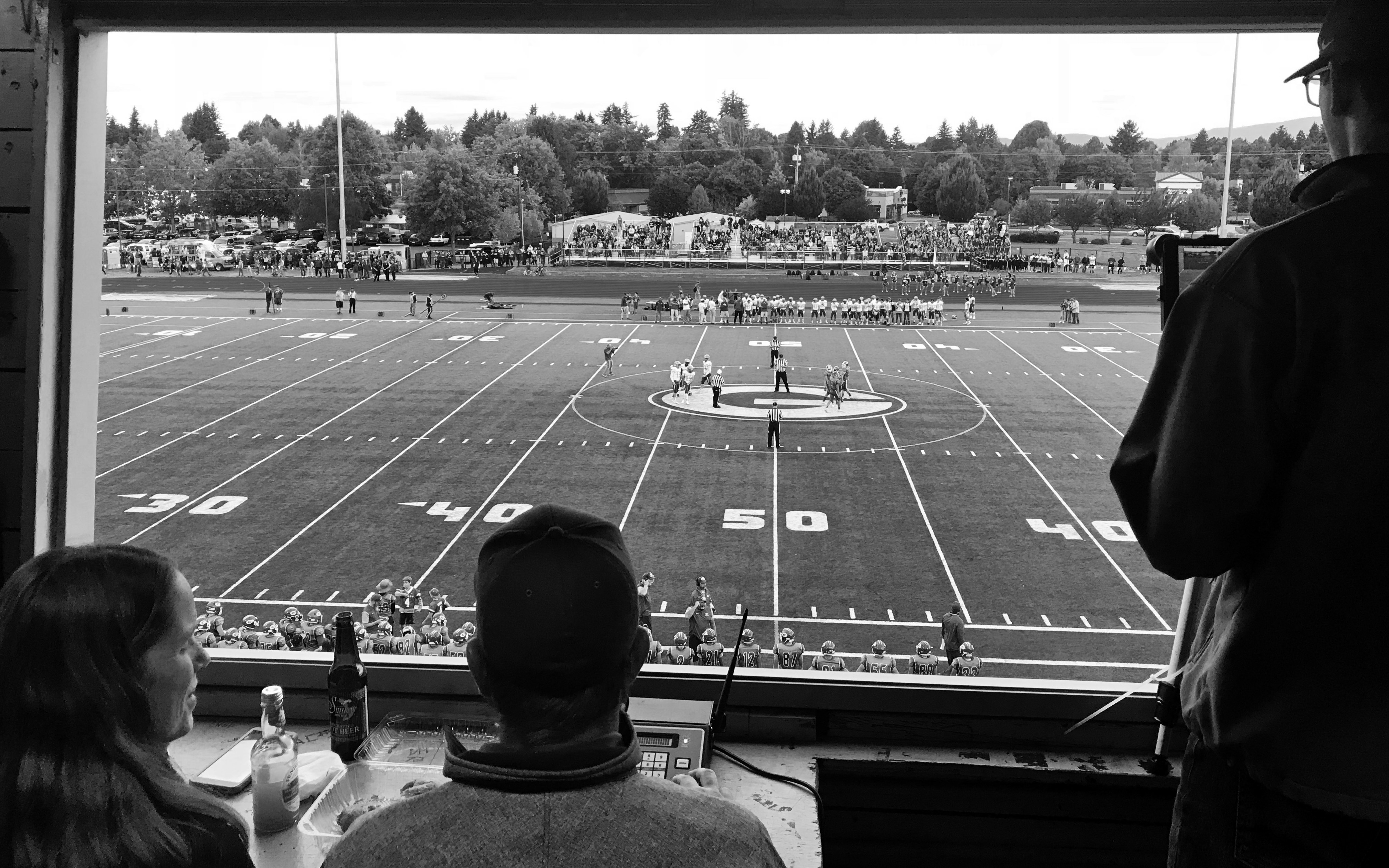 greyscale photo of football play