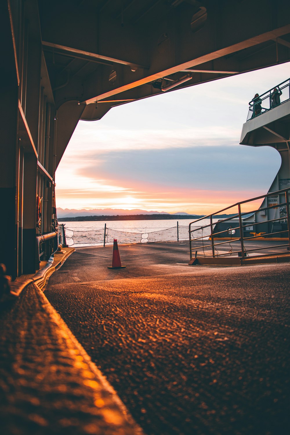 orange traffic cone on pathway