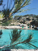 selective focus photography of concrete house near blue water