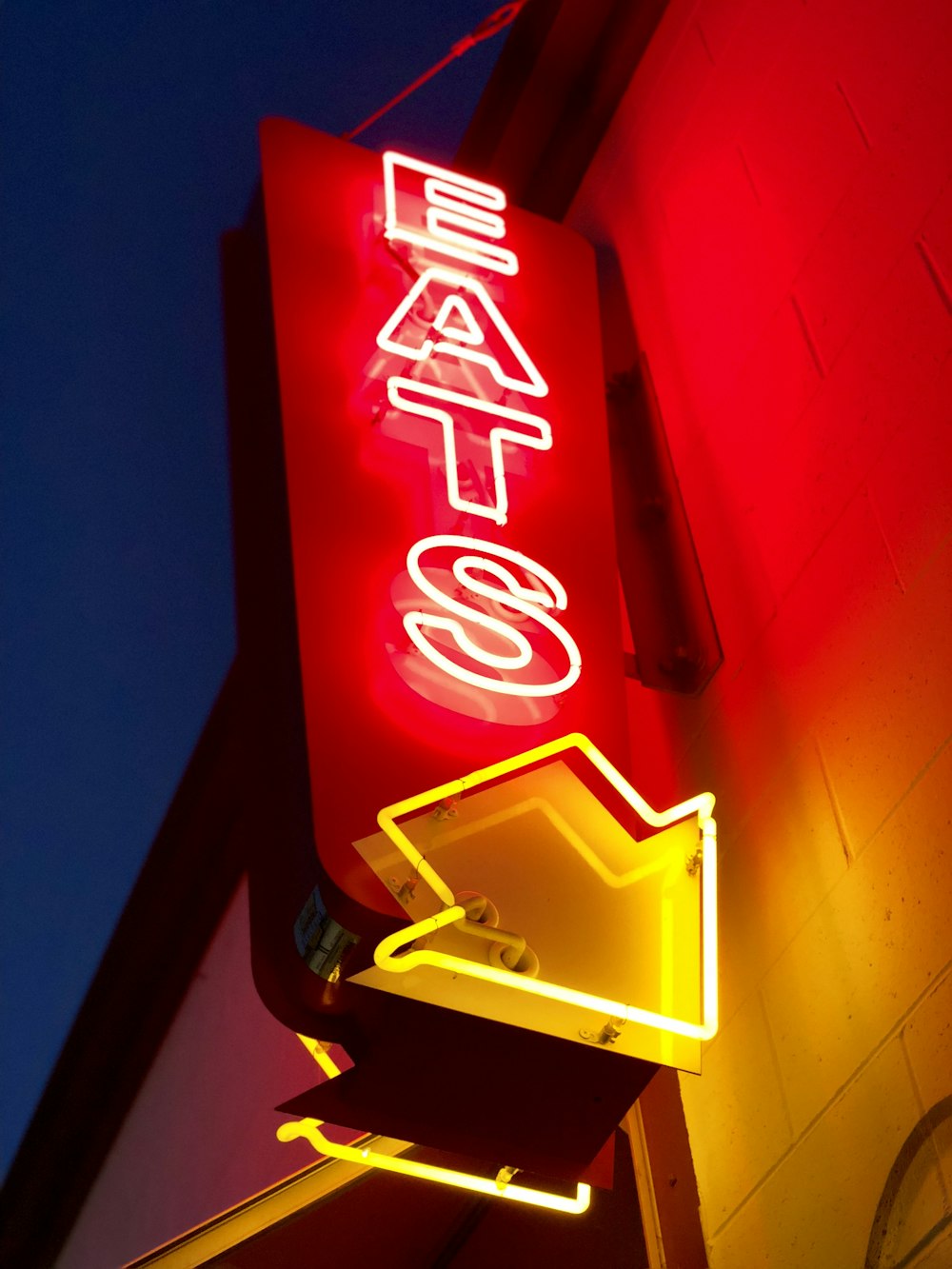 red and yellow eats LED signage turned on
