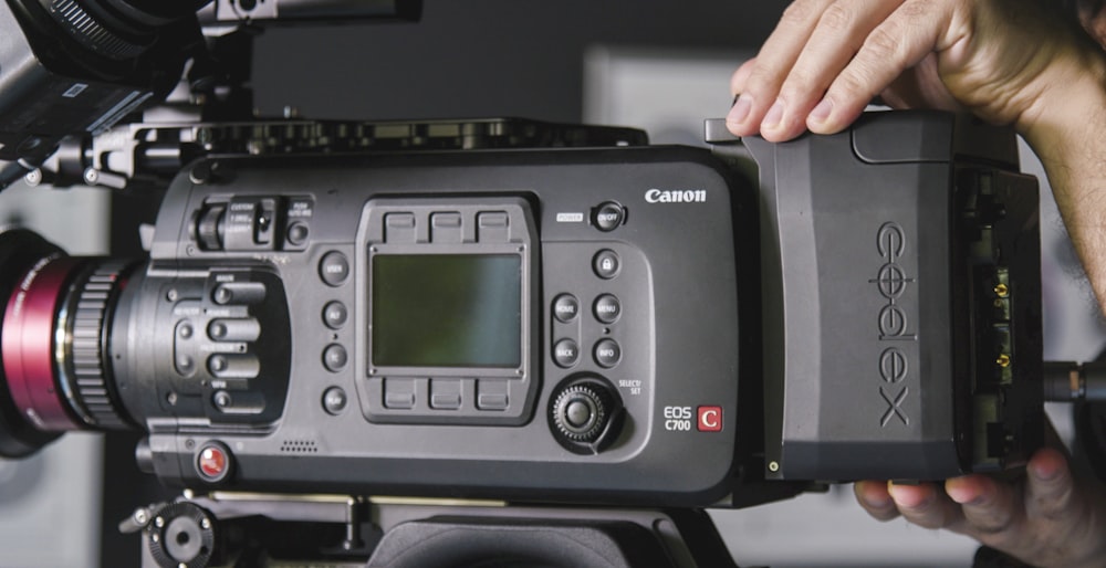 person using Canon Codex video camera