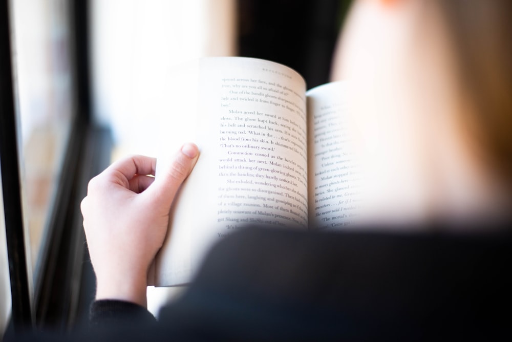 person reading book