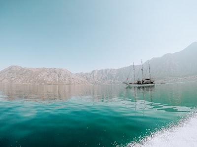 boat on body of water montenegro google meet background