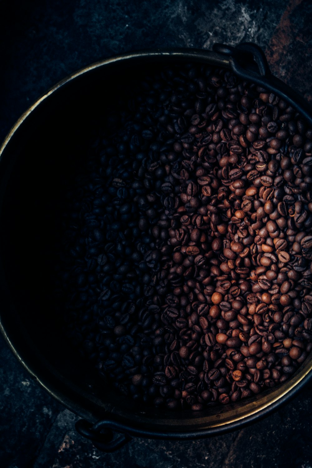 black and brown coffee beans on container
