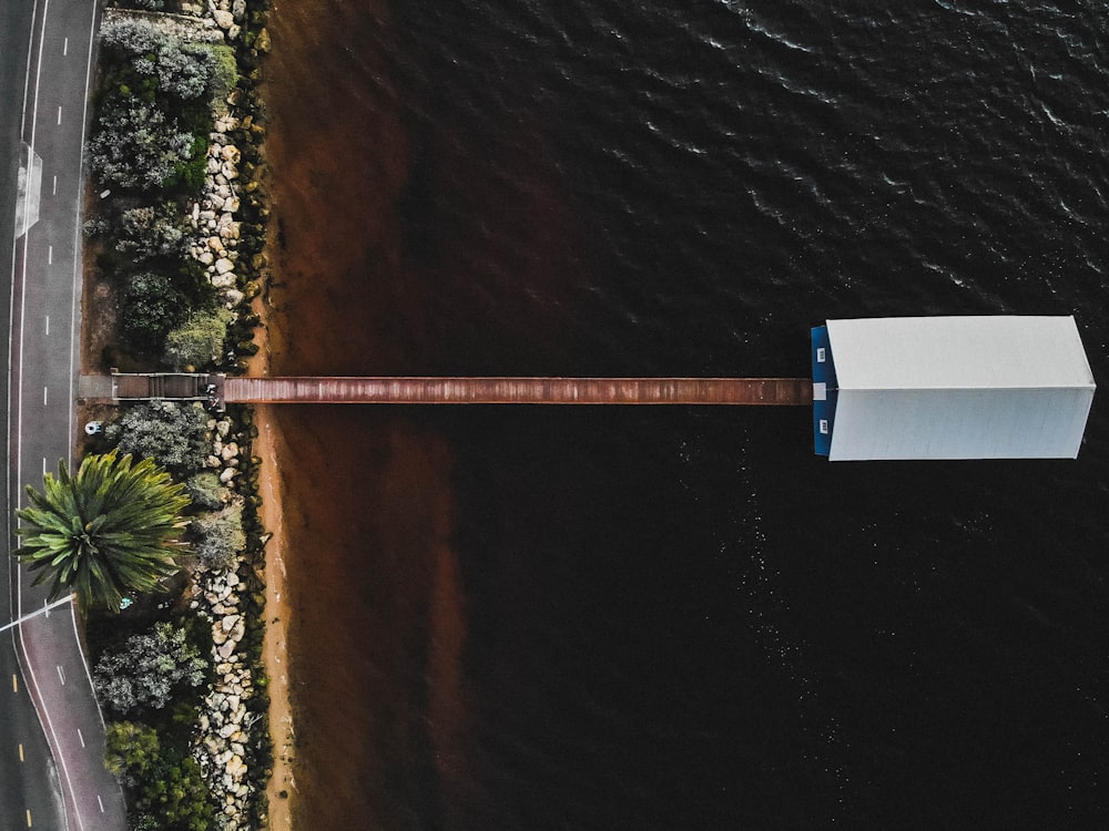 house with dock on water