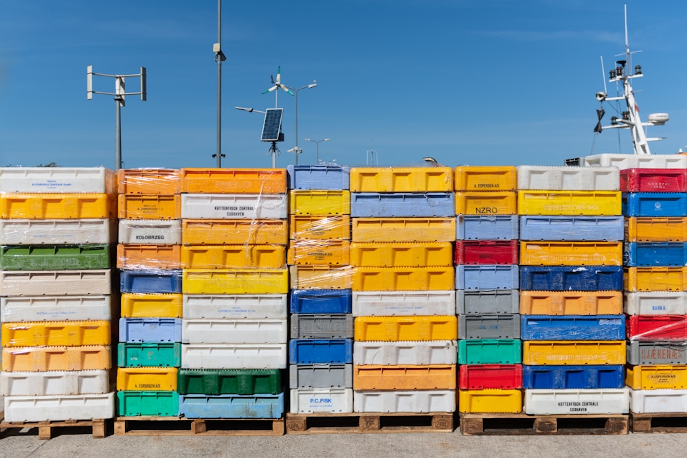 pile of assorted-color plastic crates