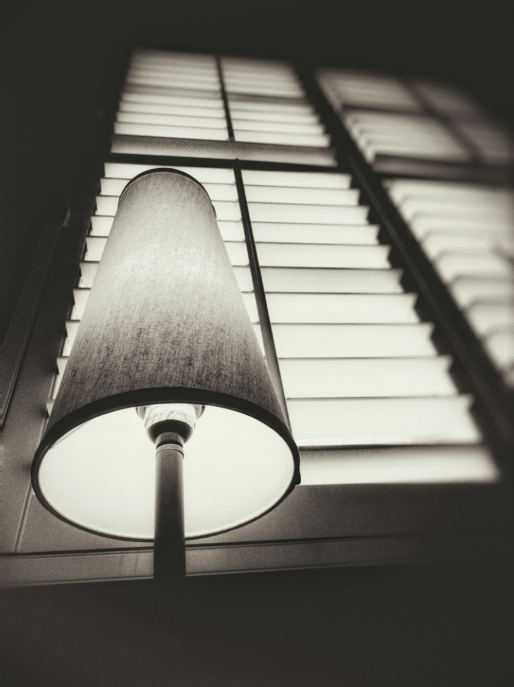 grayscale photography of table lamp