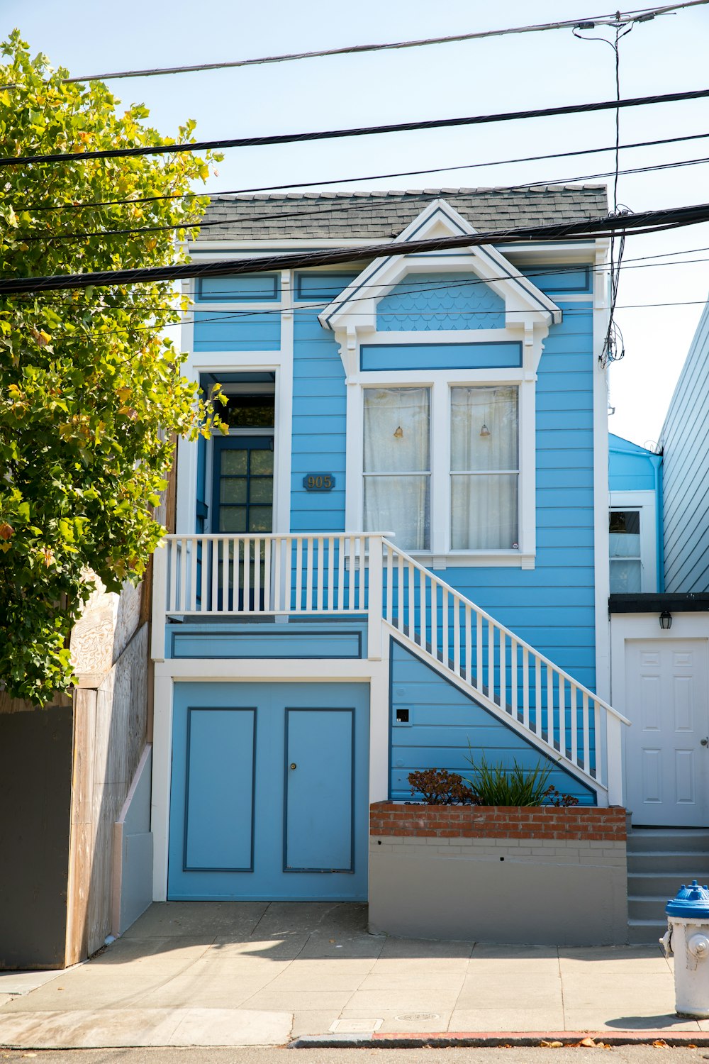 blue and white 2-storey house