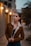 woman holding brown coat during daytime