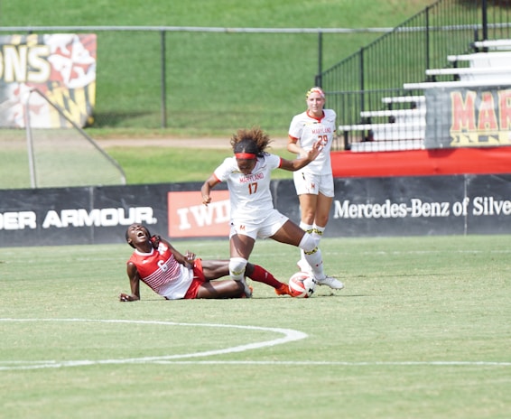 A close-up of a football player in action during a match.