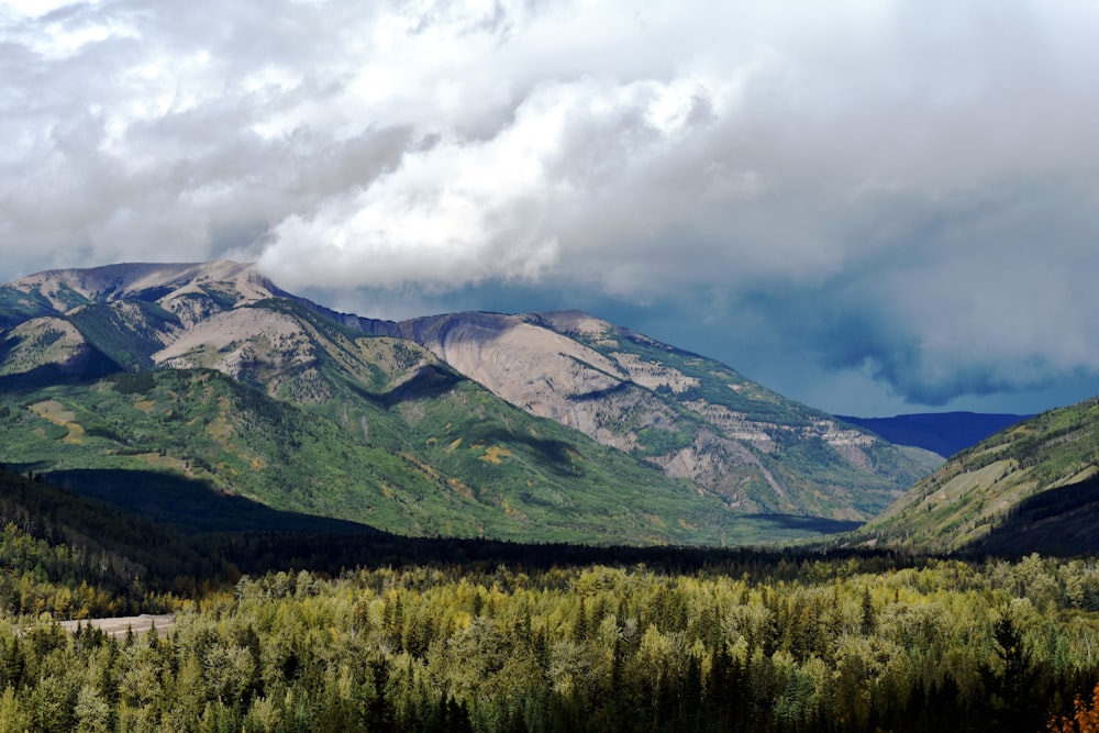 nature photography of mountains and white clouds