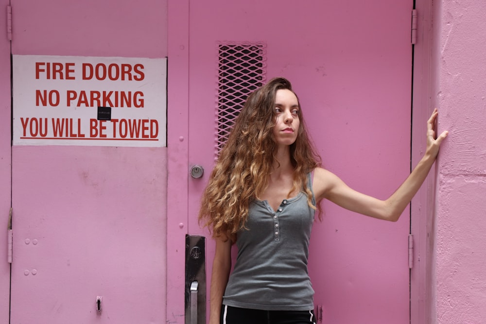 woman touching the left wall