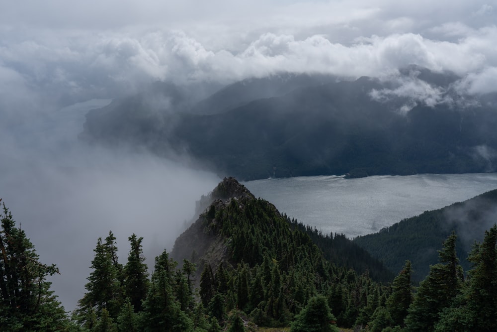 mountains under clouds during daytime