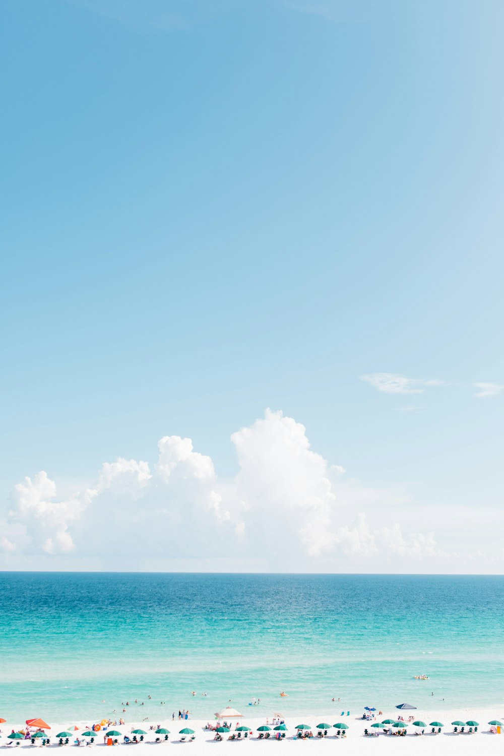 landscape photography of white sand beach