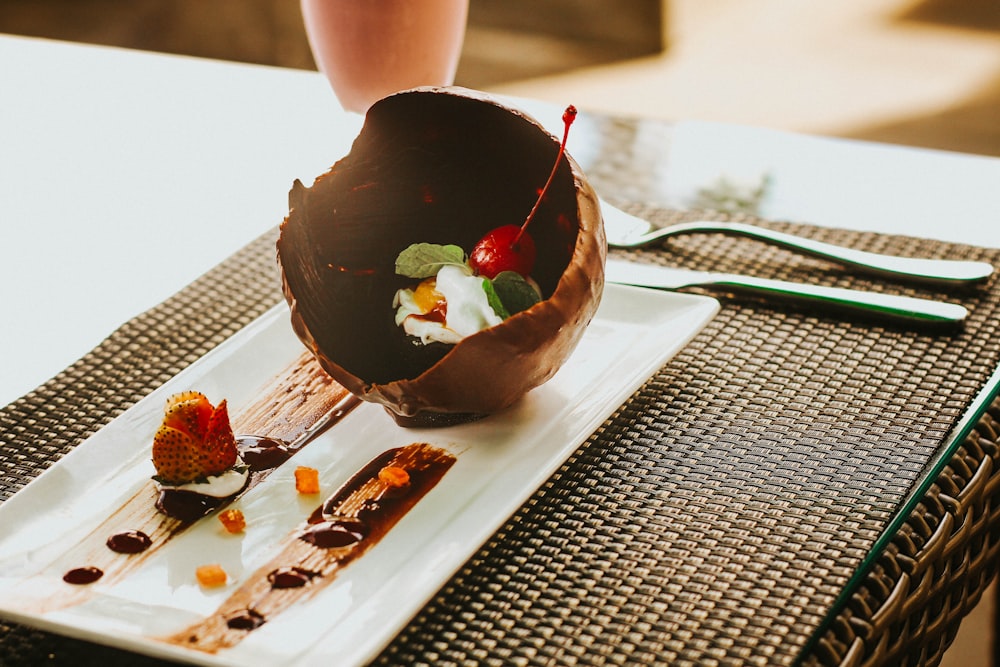 melted chocolate ball with fruits