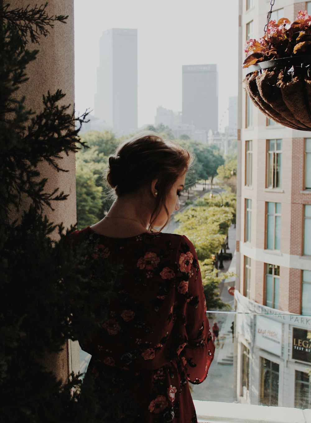 woman leaning on wall