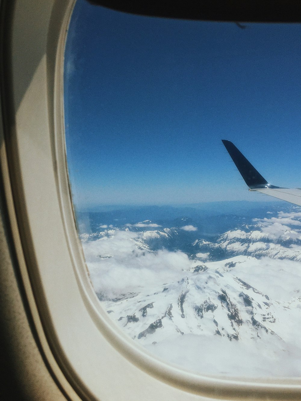 white airplane window at daytime