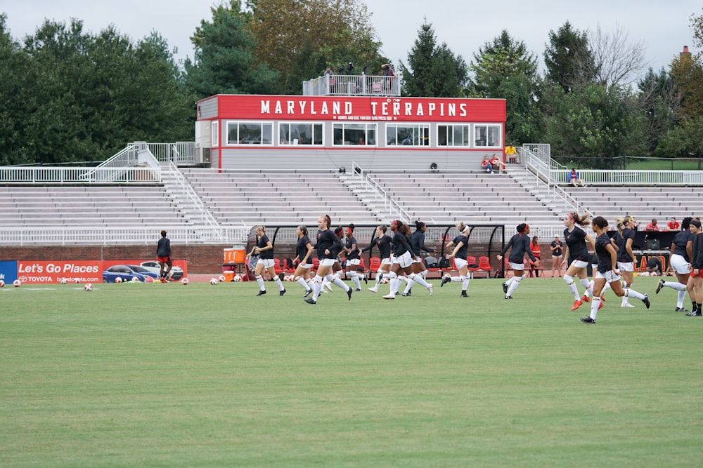 people playing football on field