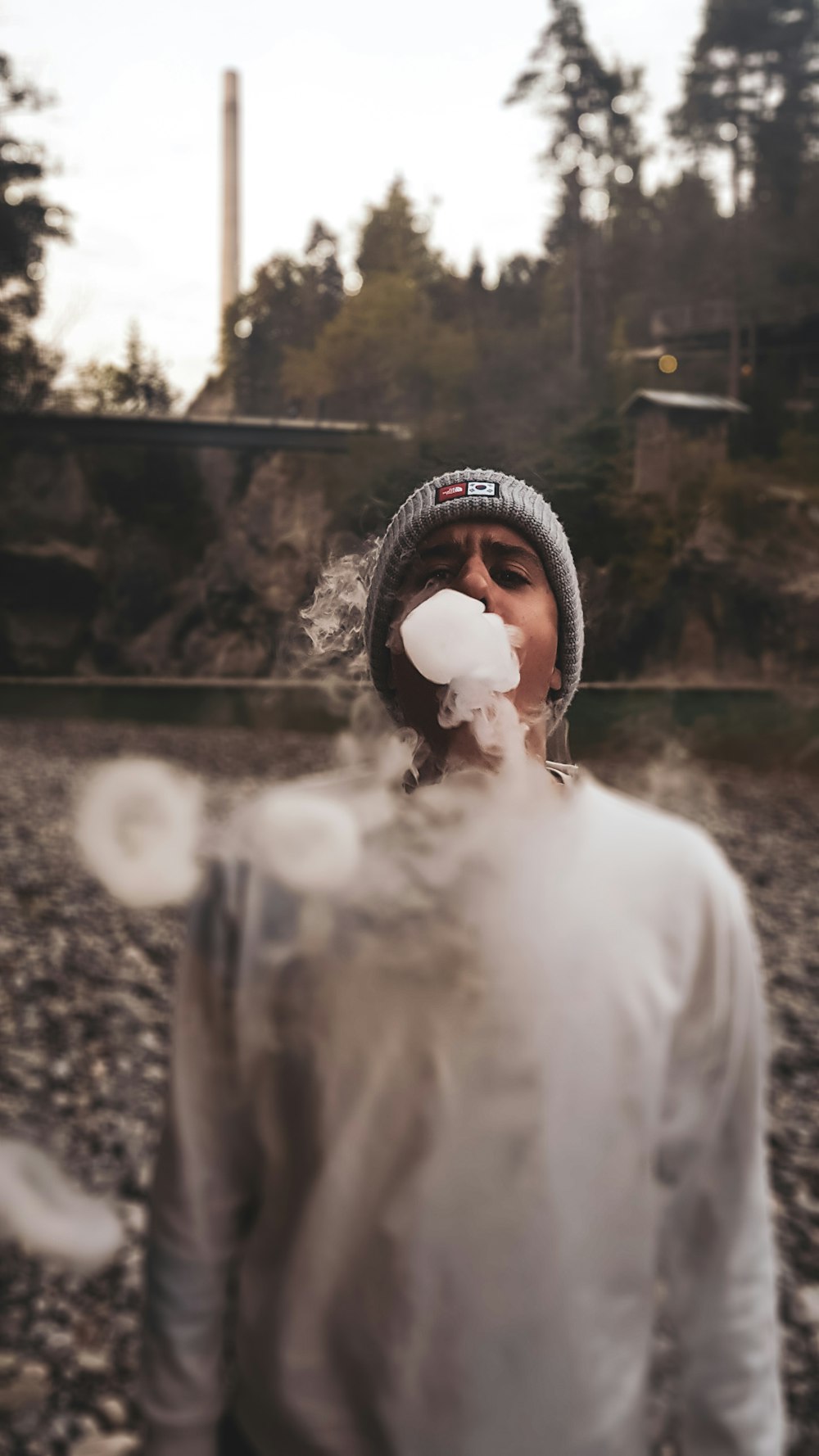 man doing smoke tricks