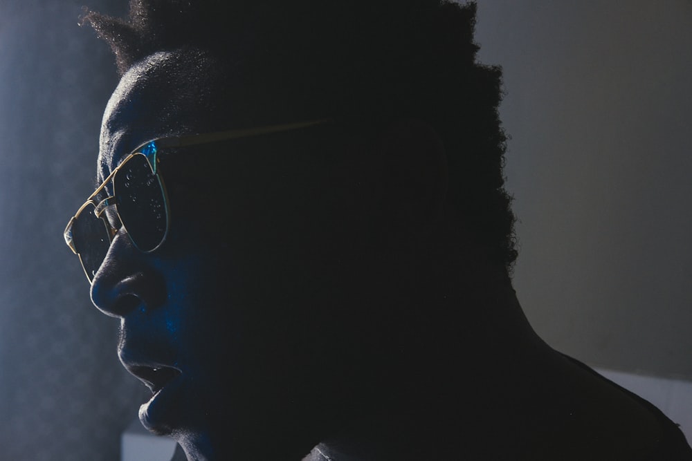 close-up photo of man wearing sunglasses