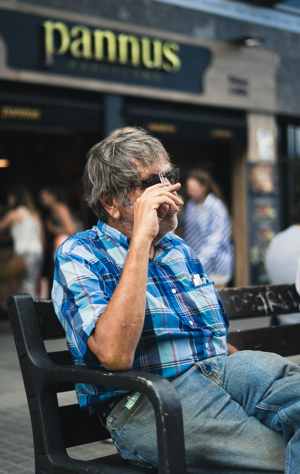 man sitting on bench