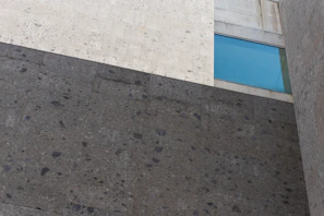 Natural gray and white stone used in a bright, spacious building exterior