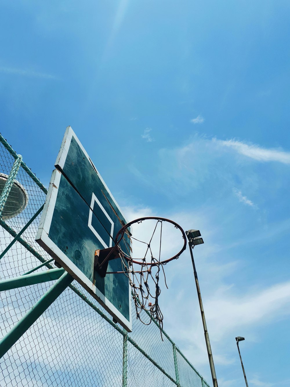 black and white basketball hoop on court