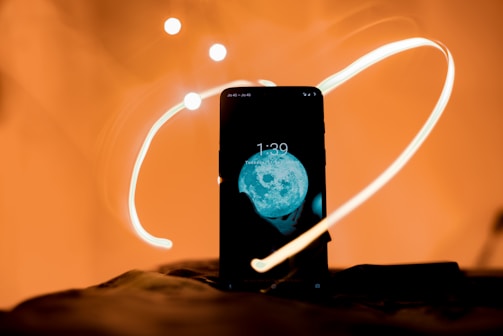 A glowing celestial-themed social media post displayed on a smartphone.