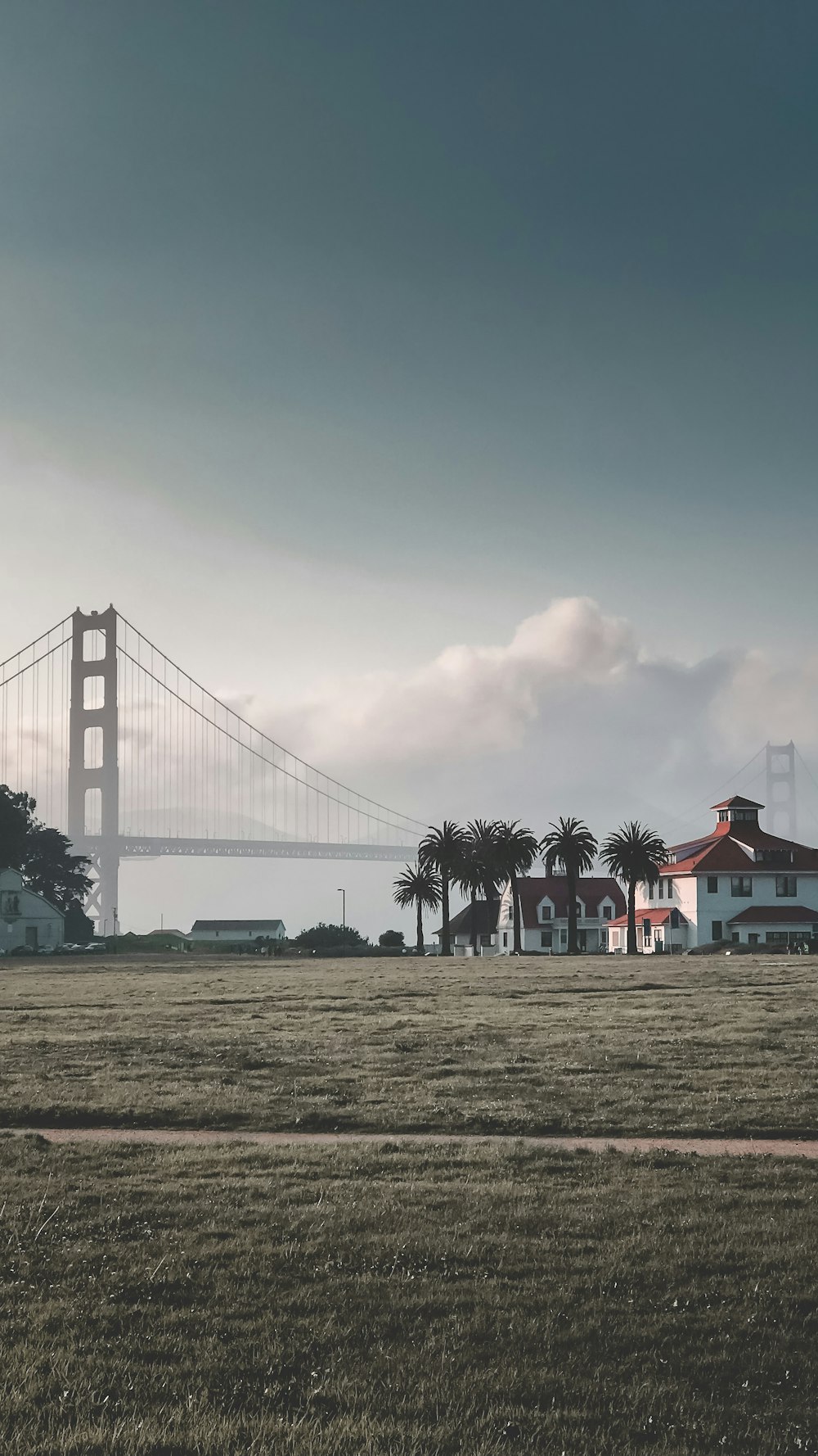 white metal bridge across field