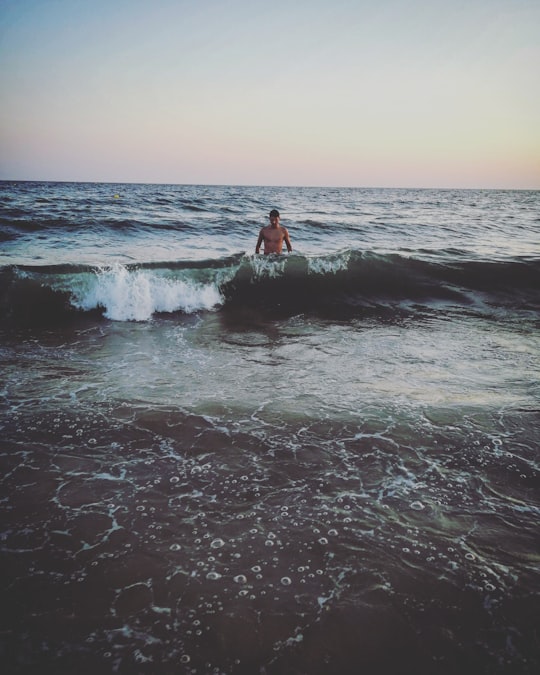 man on body of water in Matalascañas Spain