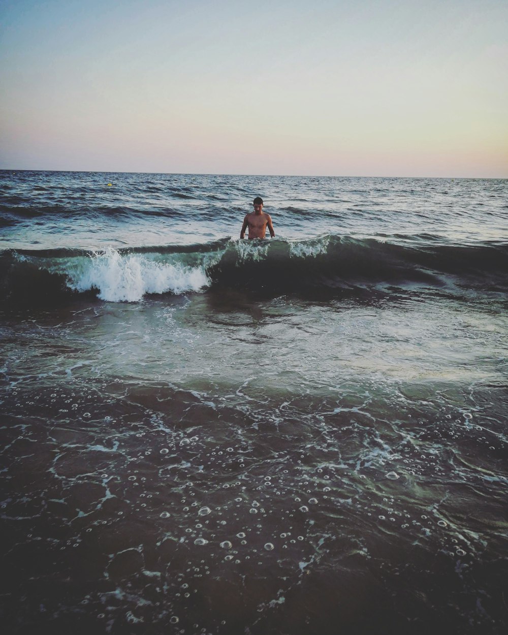 man on body of water