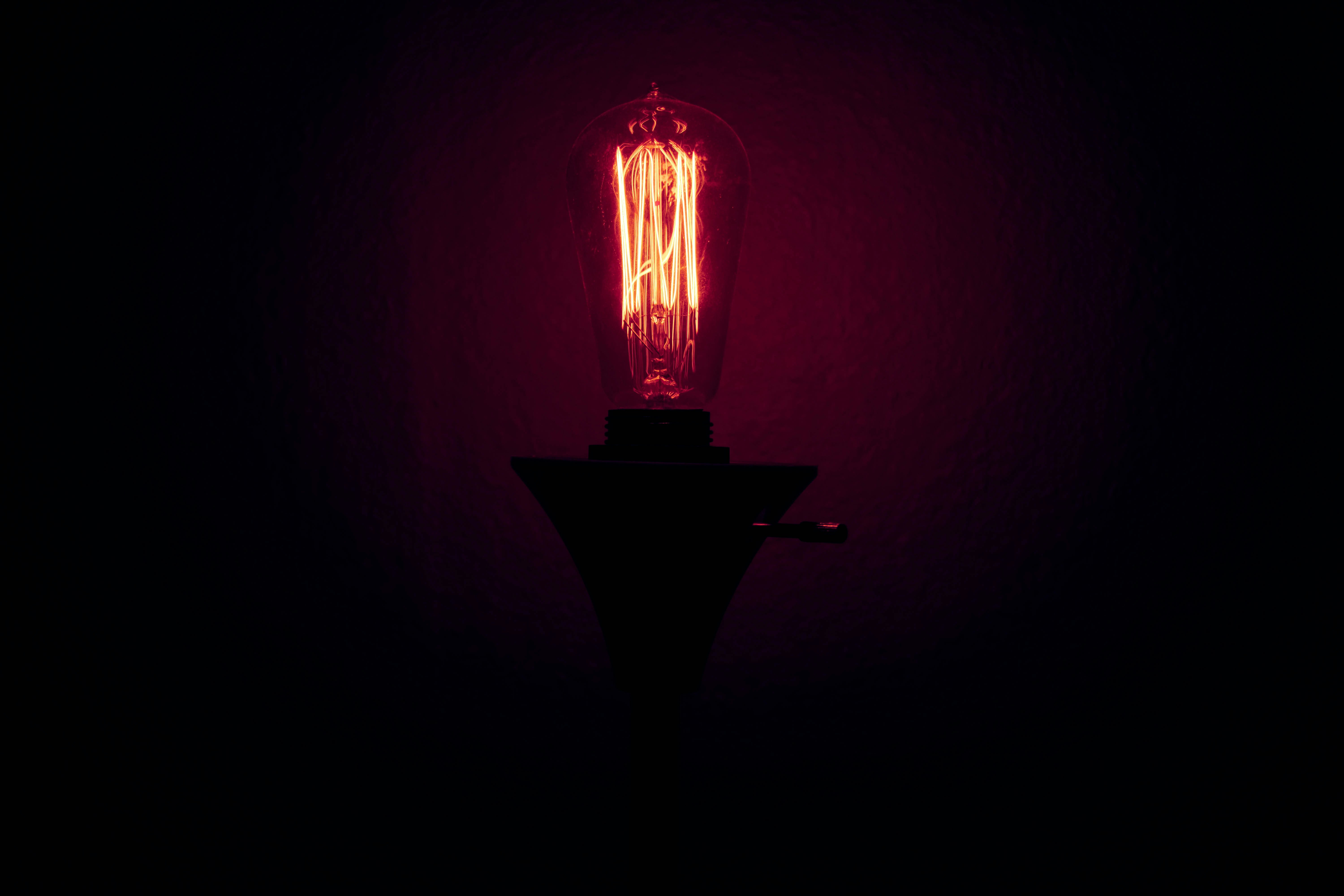 I wanted to achieve a light being surrounded by impending darkness that shines brightly, in a hopeless situation. This lamp in my apartment seemed perfect. I took the picture with all the lights off with the lamp on and in the editing process took down the highlights and added some color.