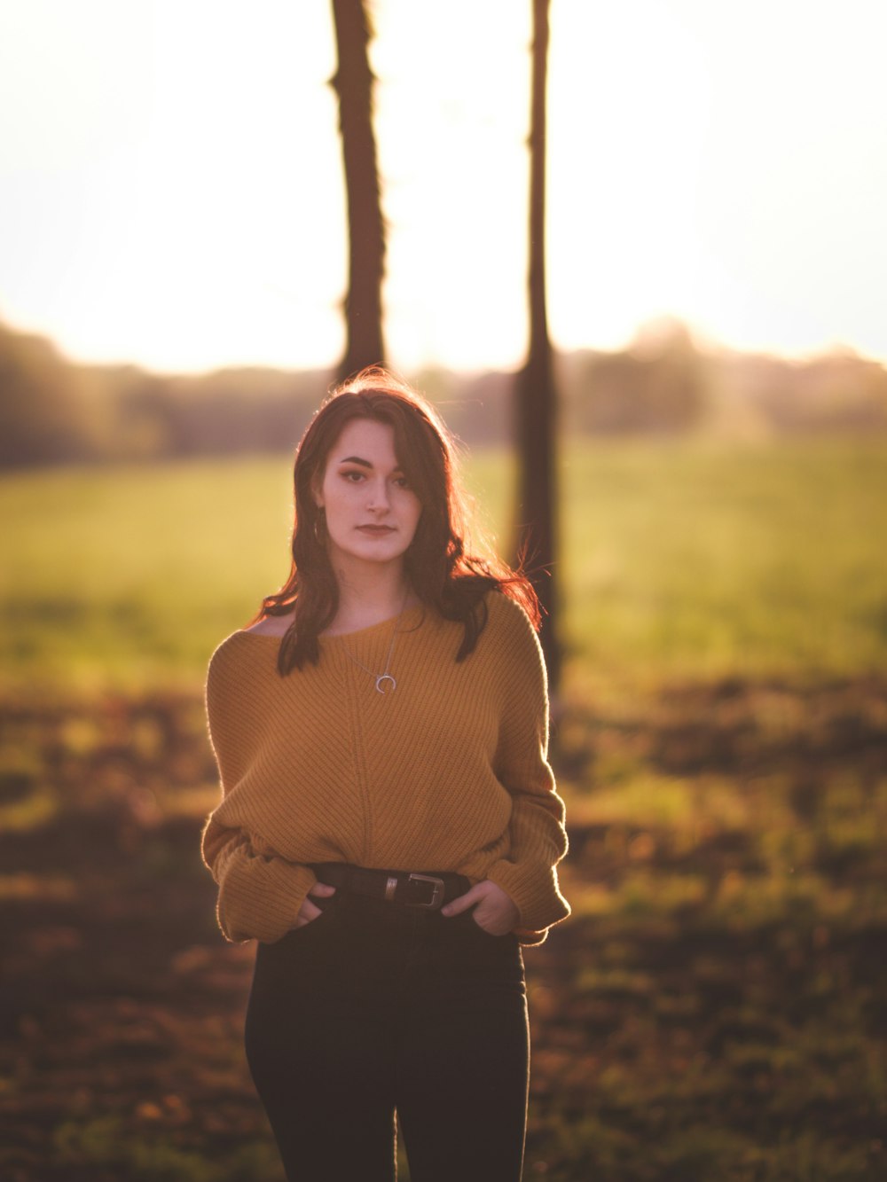 woman putting her arms on her pocket