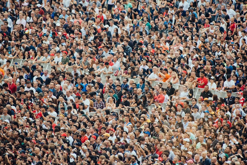 A packed college football stadium full of cheering fans