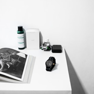 A collection of various personalized promotional items displayed on a clean, modern desk.