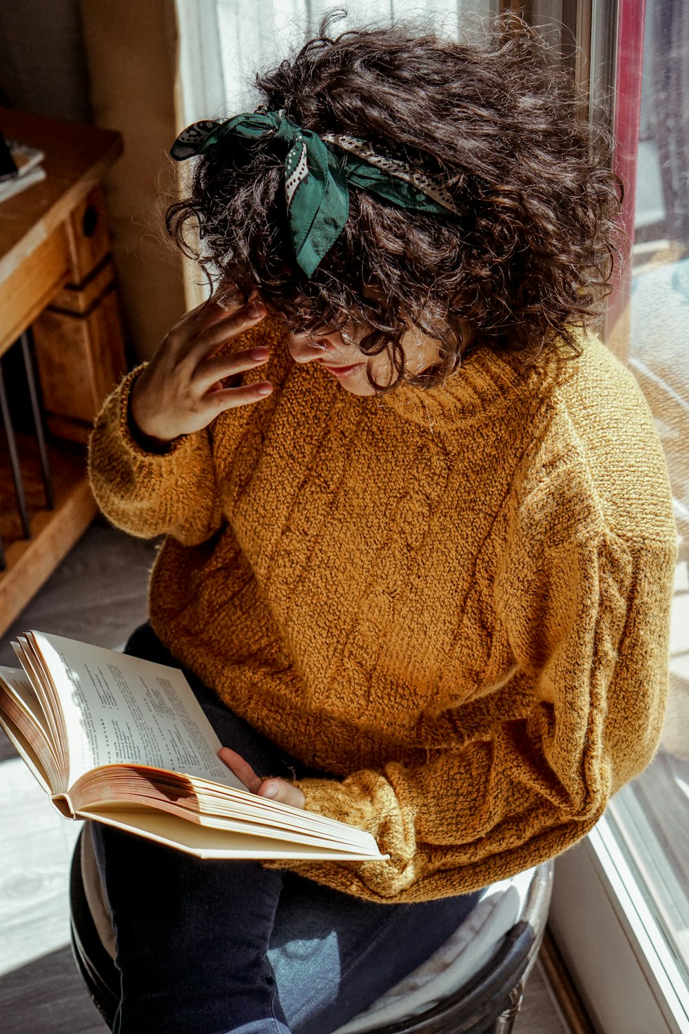 woman holding book