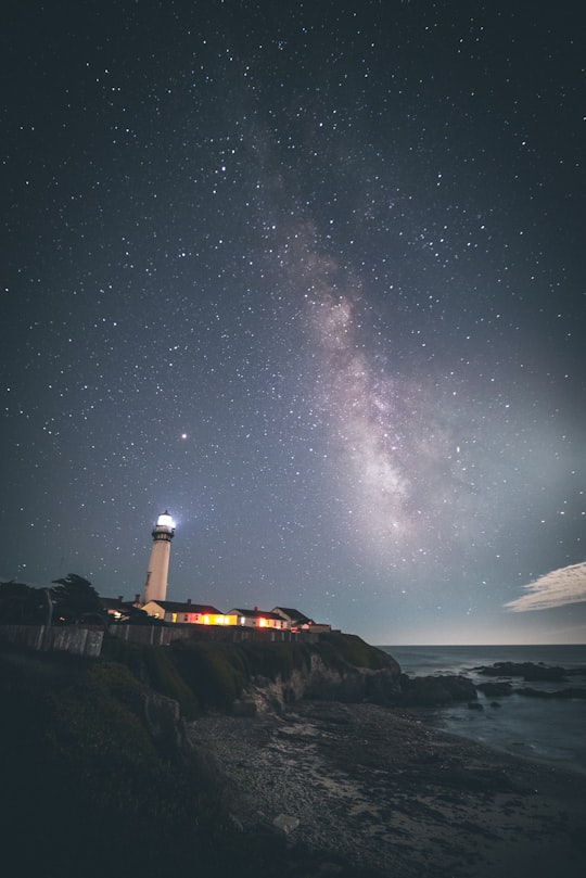 lighthouse near body of water in Pigeon Point Lighthouse United States